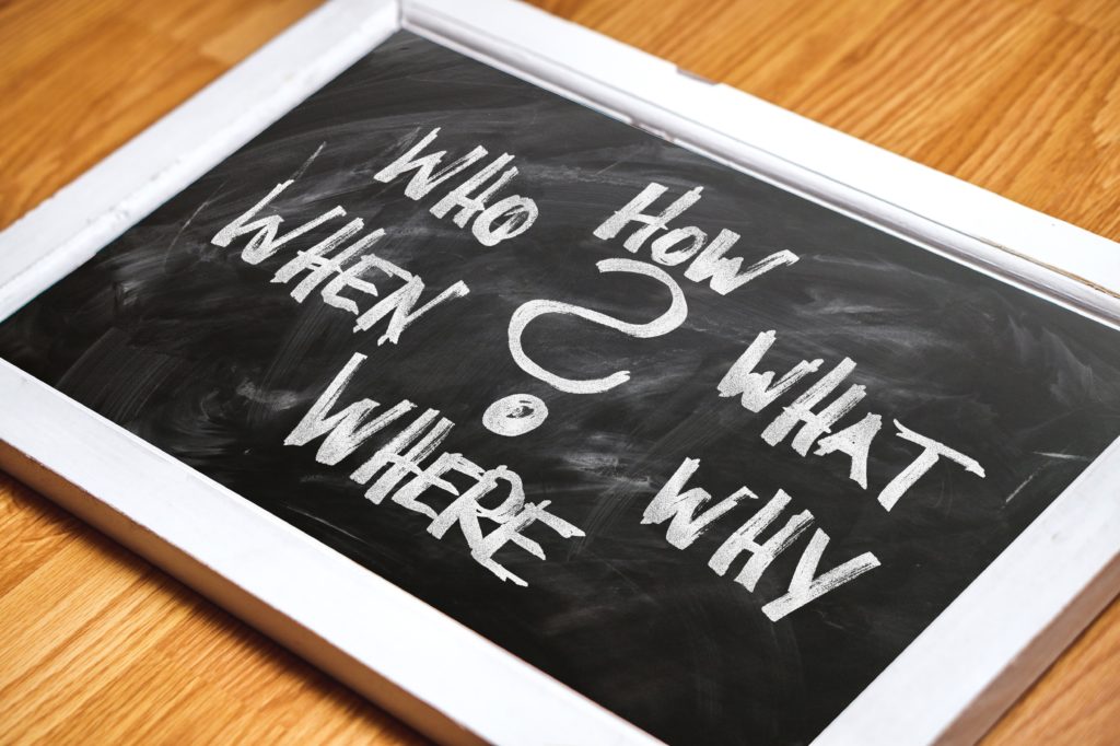 Storytelling board with who, what, where, when, why written