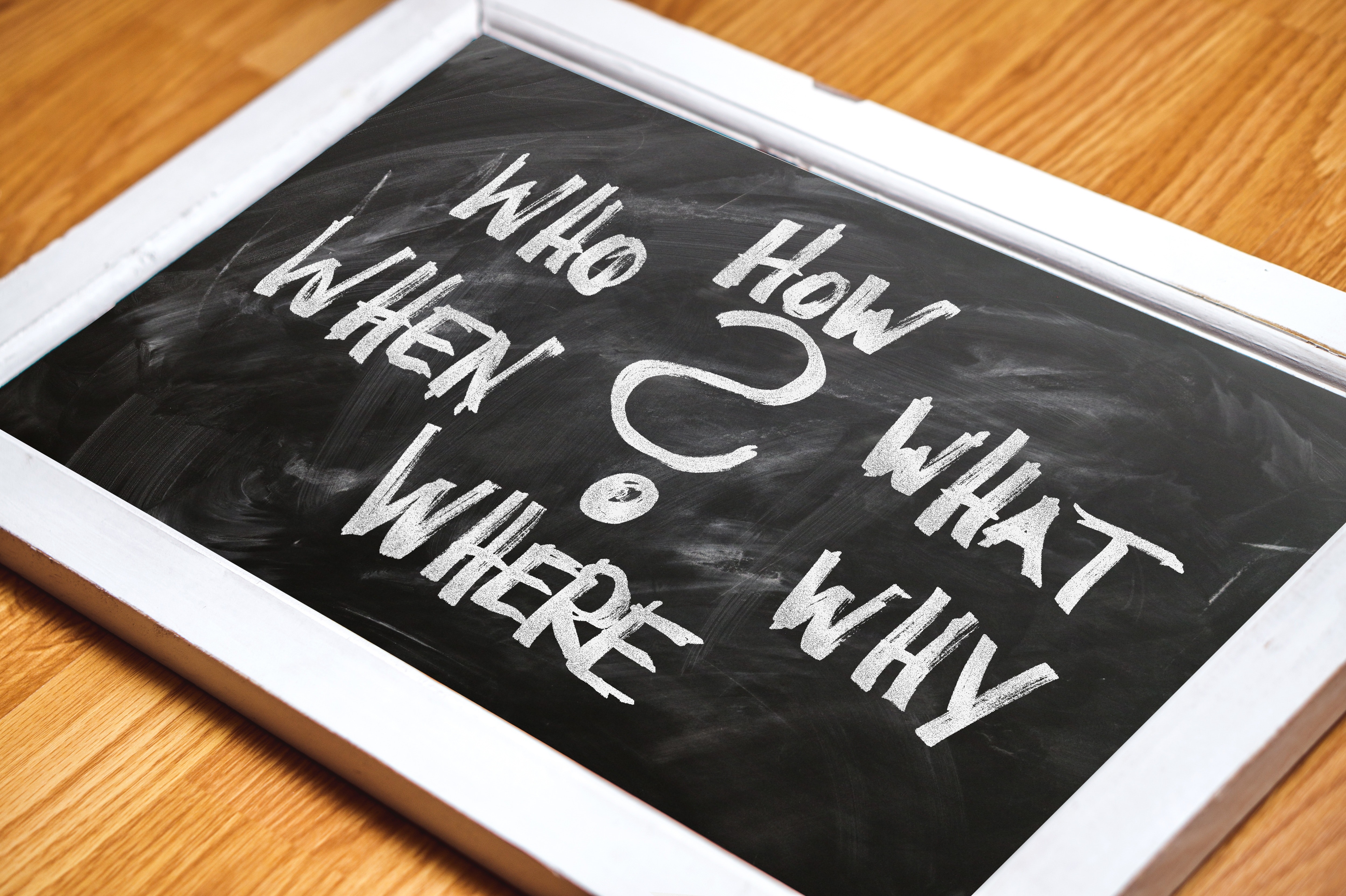 Storytelling board with who, what, where, when, why written